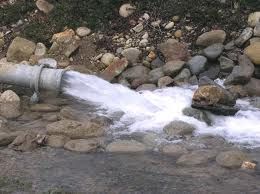 water rushing onto rocks - gray water