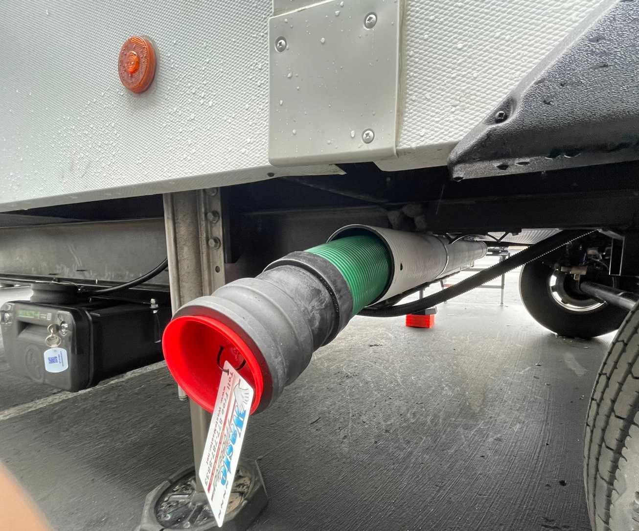 Waste MasterĀ® Extension Hose Stored on RV